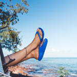 Blue Slappas durable arch support thongs  legs out the kombi